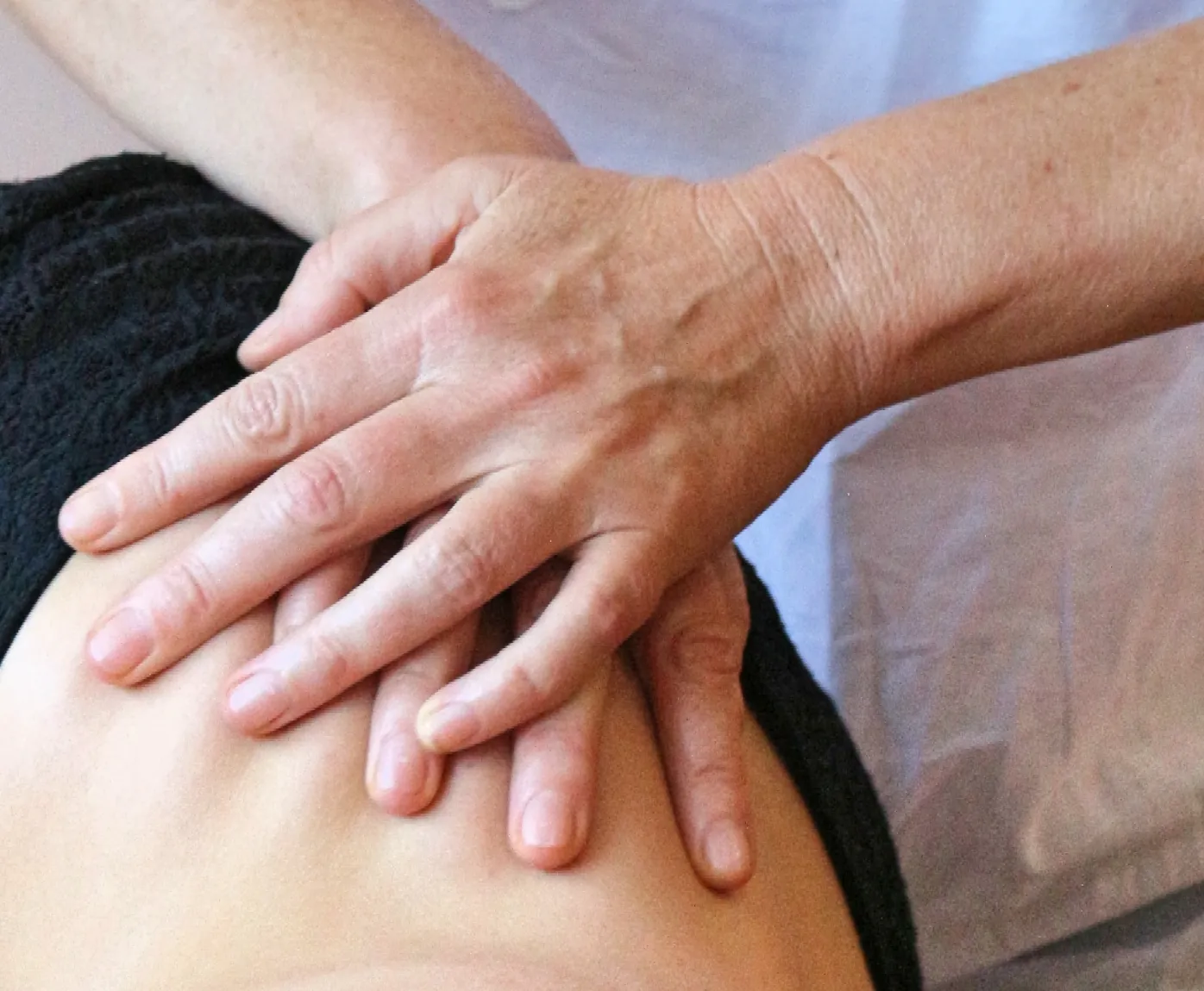 Mains, massage du dos